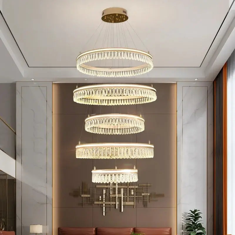 Modern three tier gold crystal led chandelier with cascading droplets for dining room decorbites modern crystal lighting