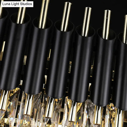 Modern tiered black ceiling light with clear crystal accents and gold metallic rods for kitchen island lighting