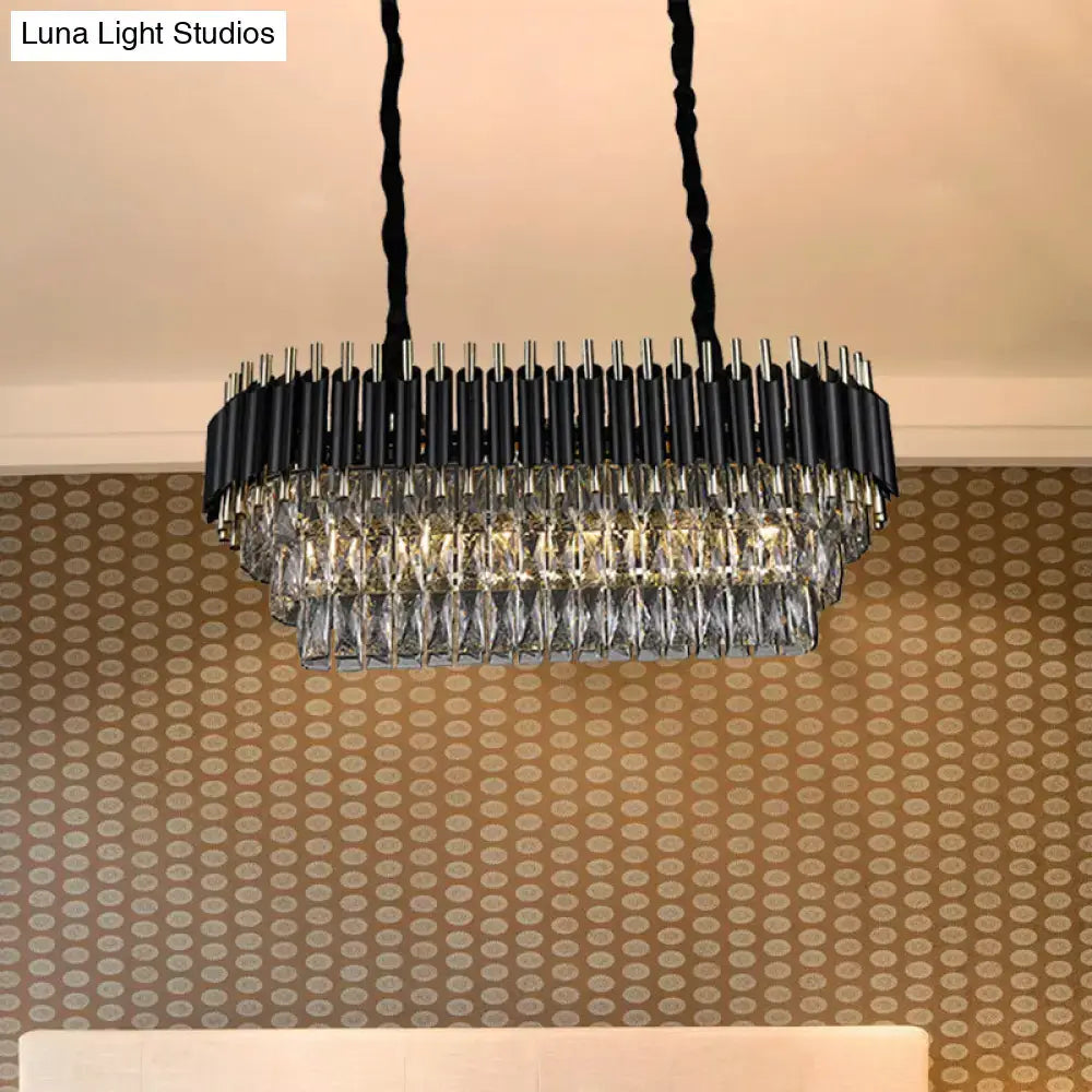 Modern tiered black and clear crystal ceiling light with a sleek design ideal for kitchen island lighting