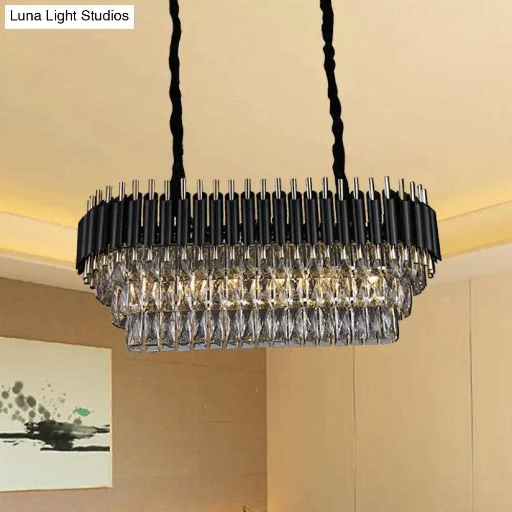 Modern tiered black and clear crystal ceiling light with a sleek design ideal for kitchen island lighting