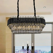 Modern tiered black and clear crystal ceiling light with a contemporary design for kitchen island lighting