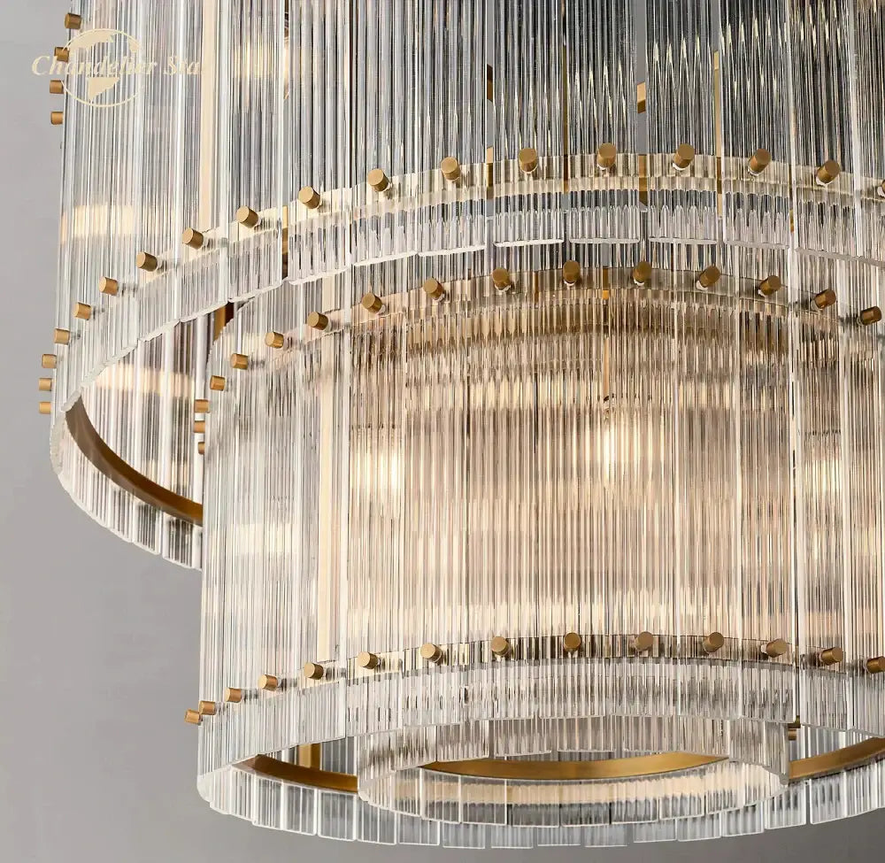 Modern tiered clear led glass chandelier with gold-toned metal accents for living room decorbites clear led pendant light