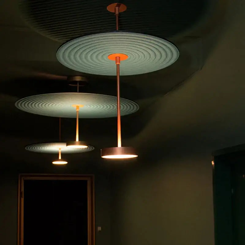Modern copper-toned decorbites cotton round led pendant lights with concentric shades for stylish bedroom decor