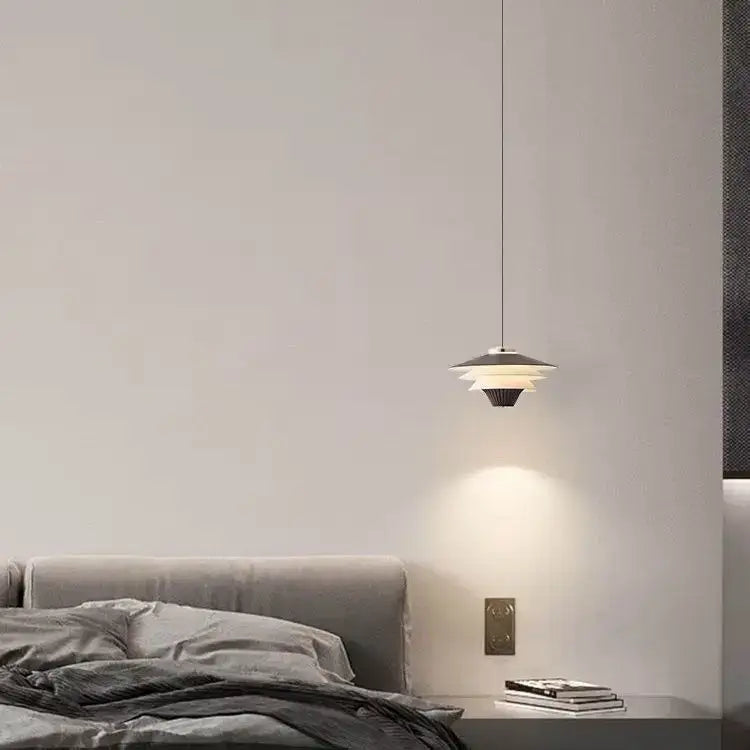 Modern tiered pendant lights with cream wind milk glass and matte black disc-shaped design for kitchen dining use