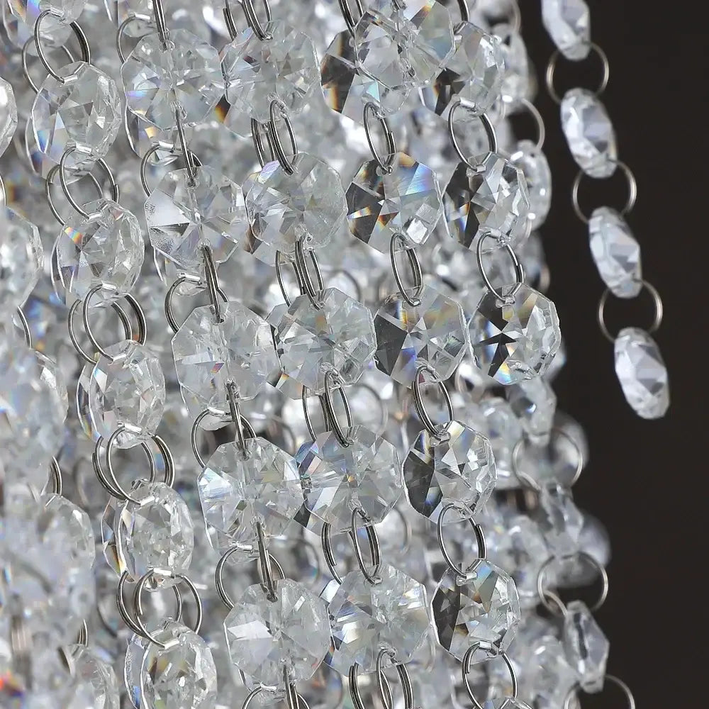 Clear faceted crystal beads on silver chains in a modern tiered decorbites colorful crystal chandelier for staircase