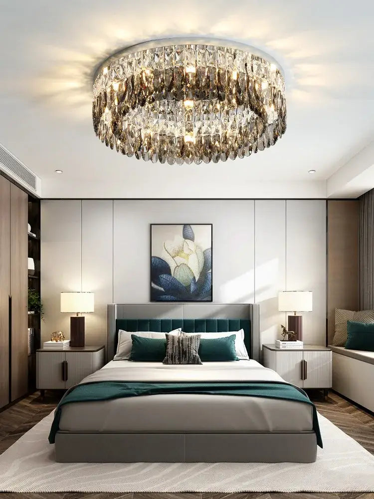 Modern tiered decorbites crystal chrome ceiling lamp with circular faceted crystals emitting a warm glow for living room