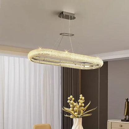 Modern tiered elegant chrome crystal chandelier with oval metallic frame and crystal accents for dining room decorbites elegant chrome