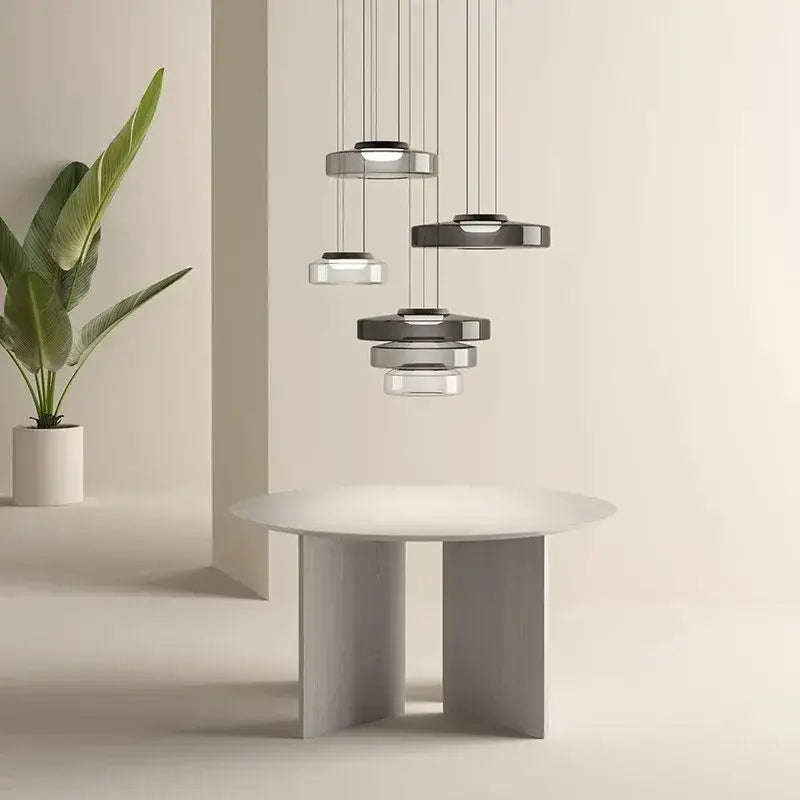 Modern tiered glass pendant light with sleek circular metal and glass shades in varying sizes for kitchen island decorbites bohemia glass