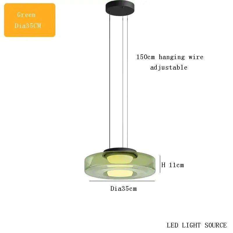 Modern tiered green glass pendant light with circular translucent shade and black metal hardware for kitchen island decorbites bohemia glass