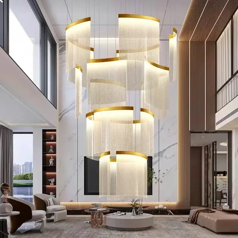 A modern tiered gold led ceiling chandelier with cascading translucent panels for elegant dining room lighting