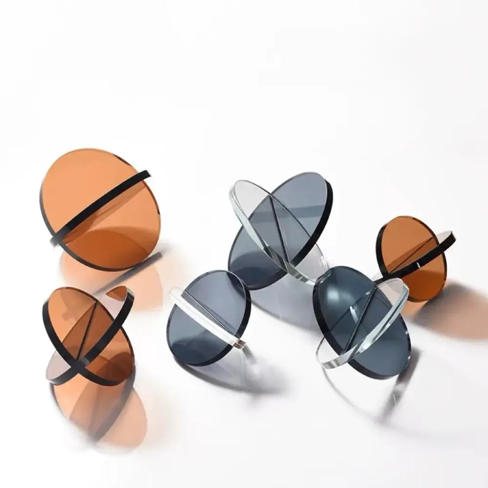 Modern tinted intersect glass ball semicircle with black and clear metallic frames for living room decorbites decor