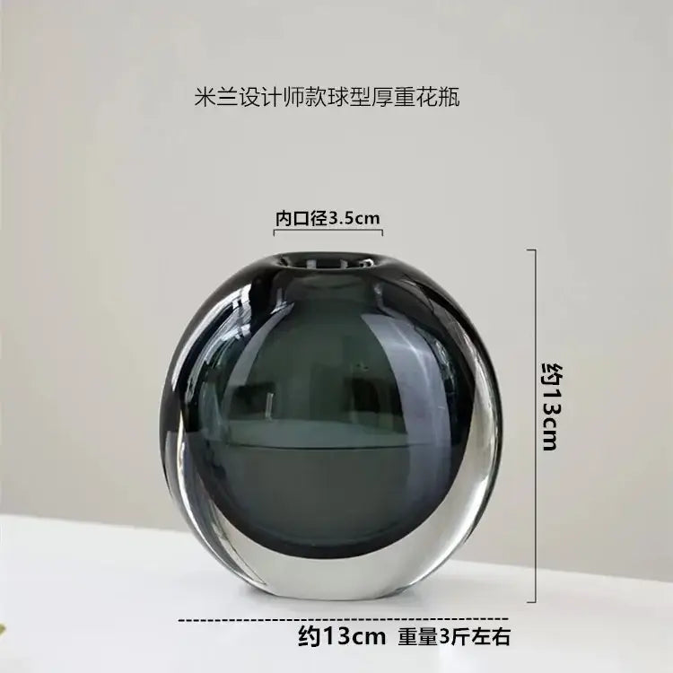A sleek spherical crystal glass flower vase with dark gray to black gradient finish for modern decorbites decor