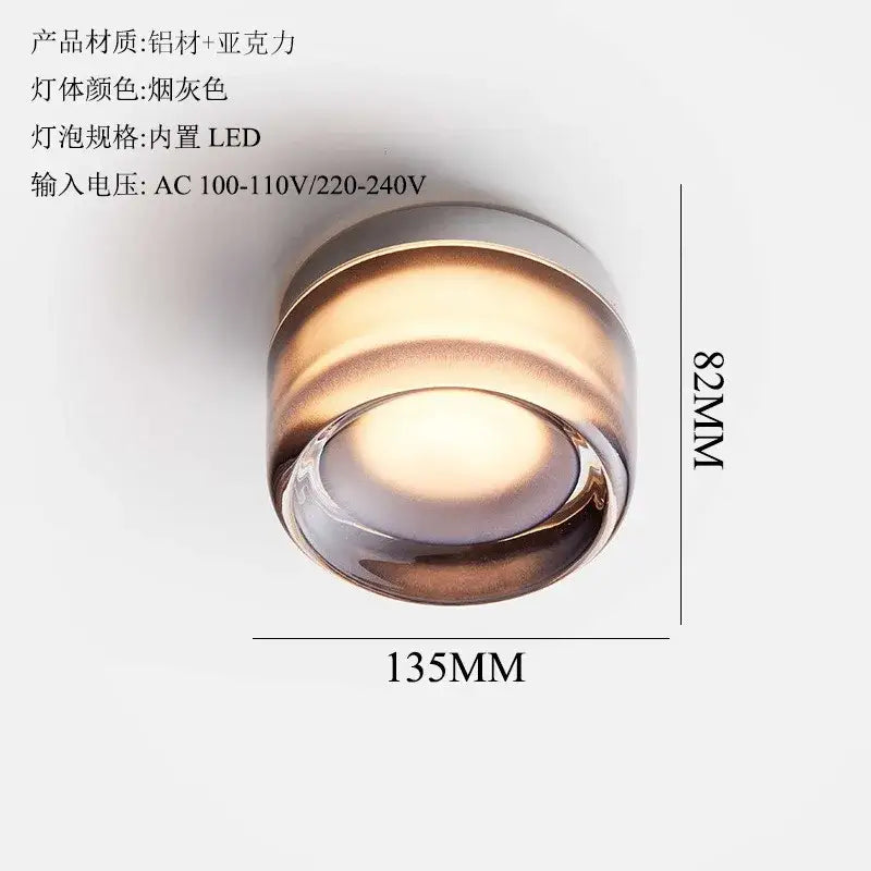 Modern translucent dimple potato chip wall lamp with matte gray aluminum and acrylic cylindrical design for bedroom lighting