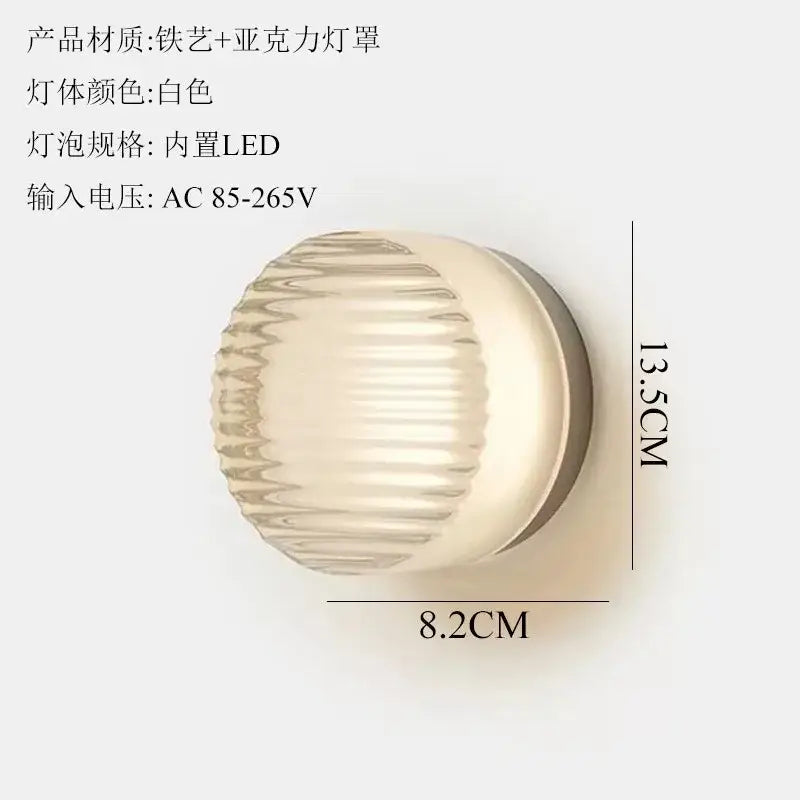 Modern translucent dimple potato chip wall lamp with white ribbed acrylic shade and iron base for bedroom lighting
