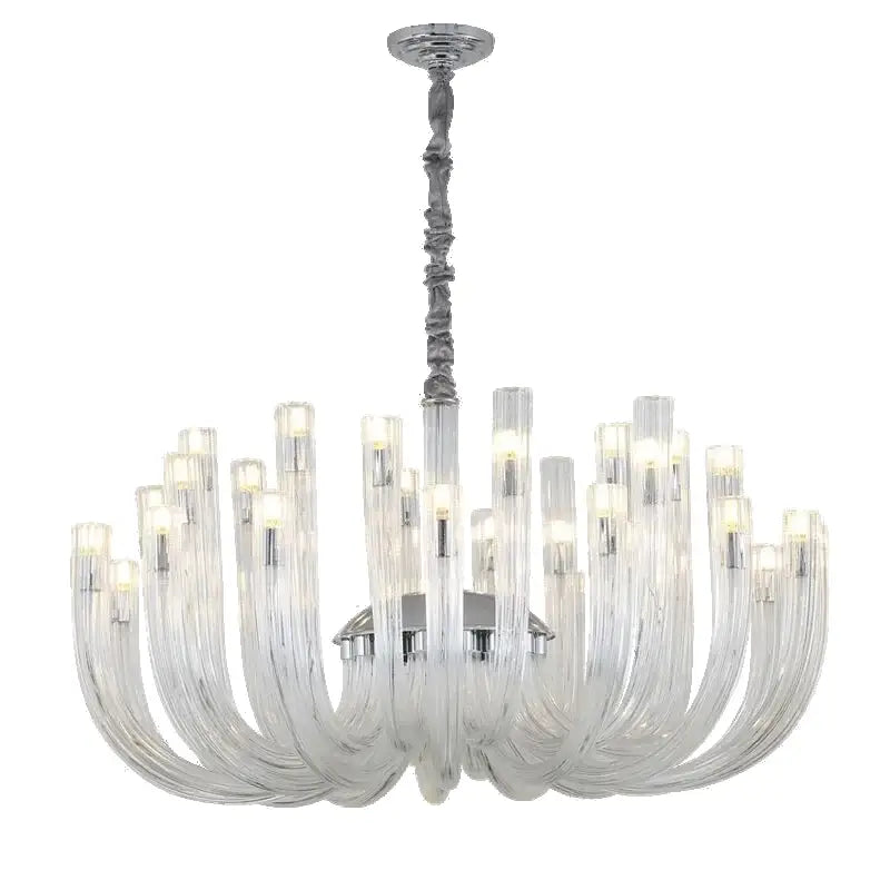 Modern transparent glass chandelier led with chrome stem and curved arms holding illuminated bulbs for dining room
