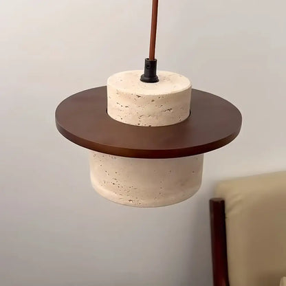 Modern travertine and walnut pendant light with textured off-white concrete body, walnut accents, copper stem, bulb included