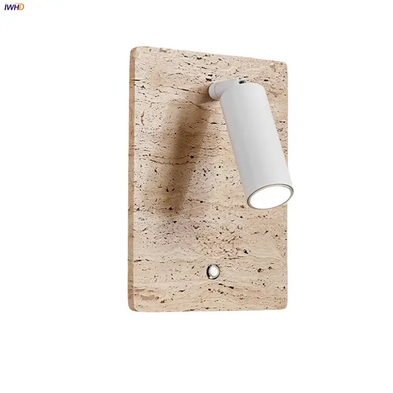 Modern travertine and white led wall light with textured beige stone base for bedroom reading by decorbites led wall
