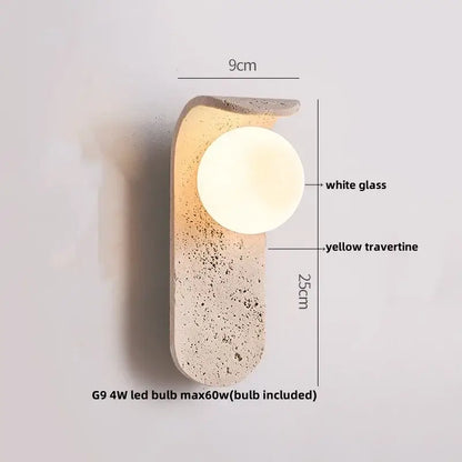 Modern travertine and white led wall light with a yellow travertine base and glass globe for bedroom reading decorbites led wall