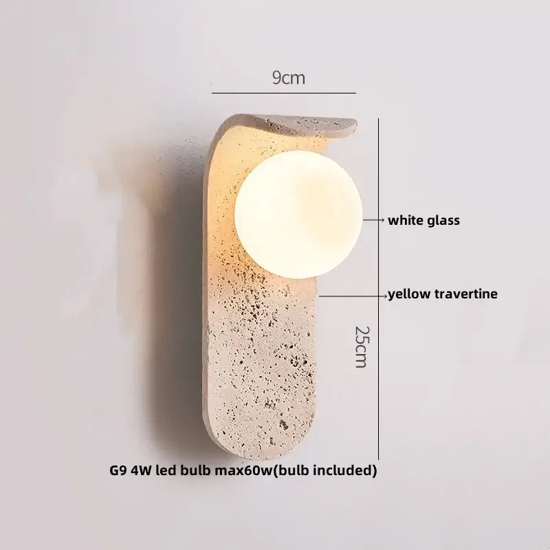 Modern travertine and white led wall light with a yellow travertine base and glass globe for bedroom reading decorbites led wall