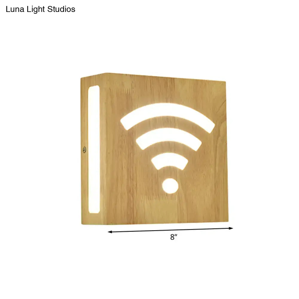 Modern tree pattern bamboo wall light with light wood grain finish and illuminated wi-fi symbol direct wired electric wall light