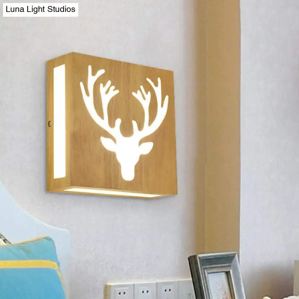 A square wooden wall light featuring a white glowing deer head cutout, made of bamboo, direct wired electric with max bulb wattage
