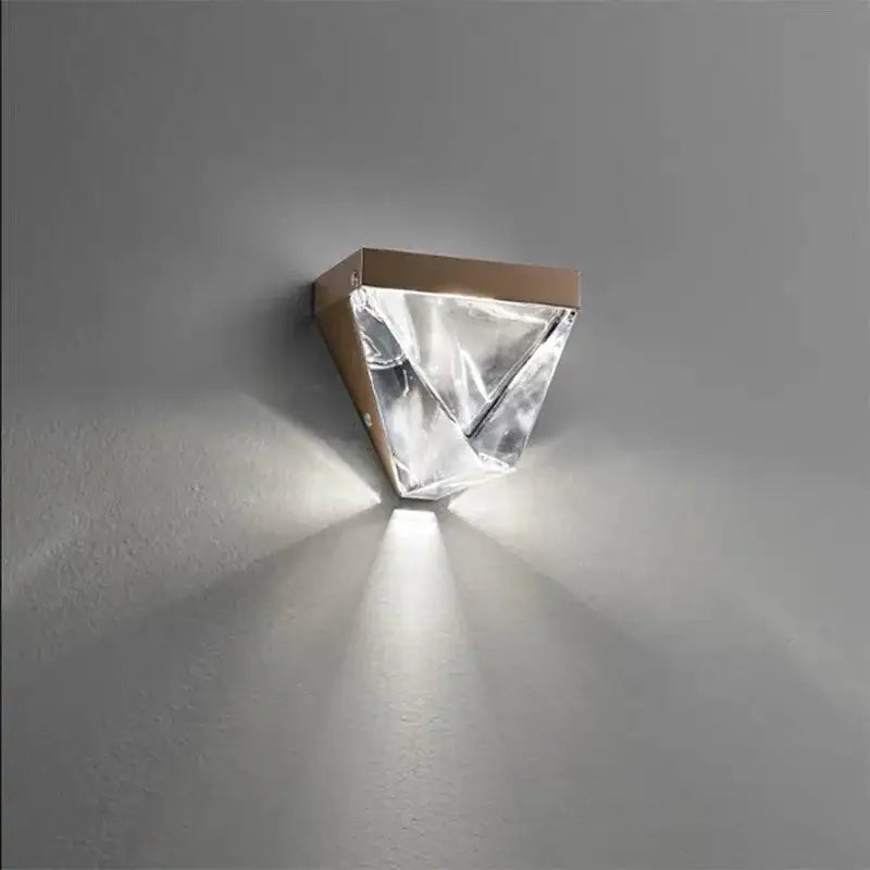 Modern triangular bronze crystal wall sconce with faceted diffuser for elegant living room decorbites crystal wall use