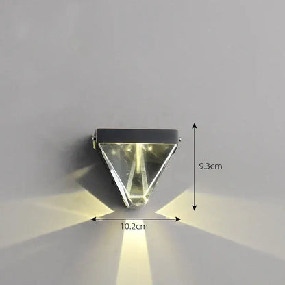 Modern triangular bronze crystal wall sconce with sleek black metal frame and warm white light for wall sconce decorbites crystal wall