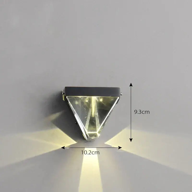 Modern triangular bronze crystal wall sconce with sleek black metal frame and warm white light for wall sconce decorbites crystal wall