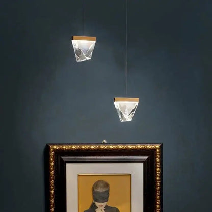 Two hanging crystal pendant lights with gold-toned tops modern triangular bronze crystal wall sconce decorbites crystal wall