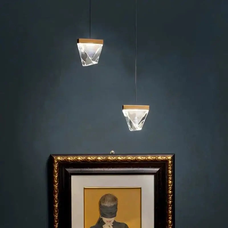 Two hanging crystal pendant lights with gold-toned tops modern triangular bronze crystal wall sconce decorbites crystal wall