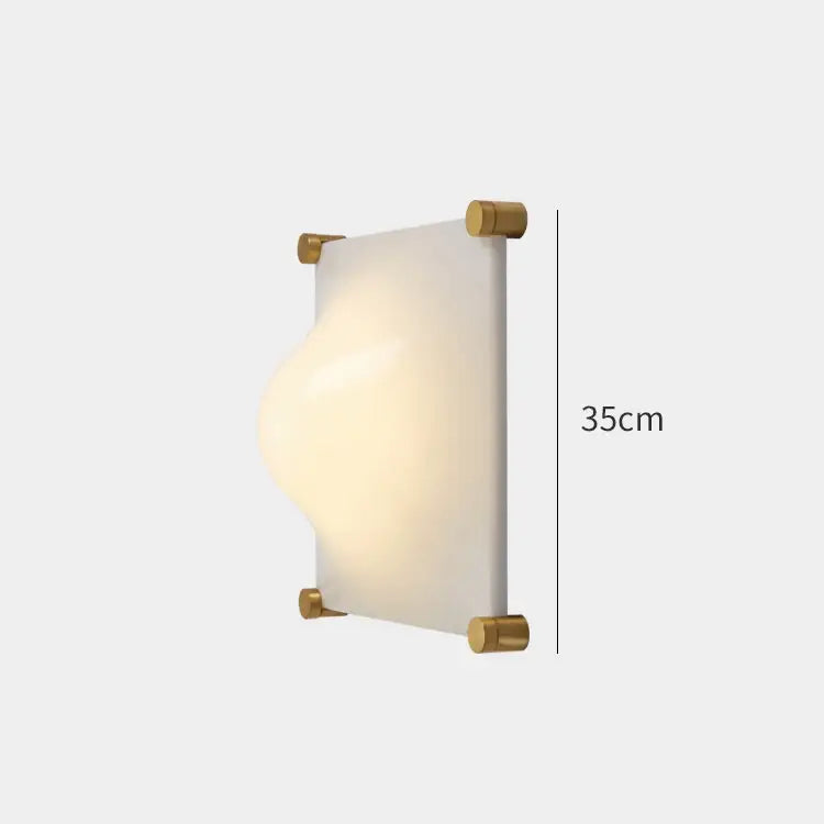 Modern triangular cream style wall lamp with frosted glass shade and brushed brass brackets for bedroom decorbites cream style
