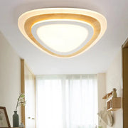 Modern DecorBites™ kids room LED flush mount ceiling light with warm wood trim and soft white acrylic diffuser