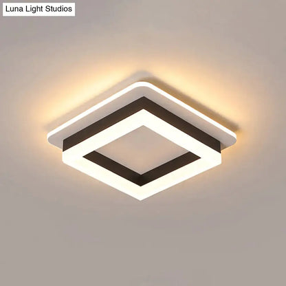 Modern DecorBites™ compact metal led flush mount ceiling light with white and black geometric design and warm acrylic diffuser glow