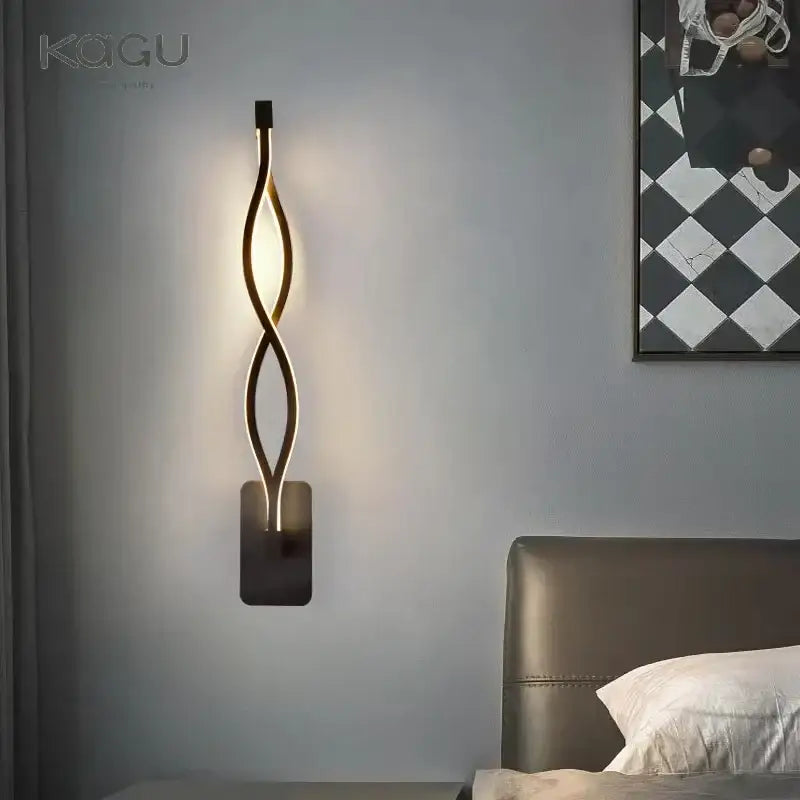 Gold-toned sleek twisted led wall lamp with modern minimalist design for stylish bedroom lighting wall lamps