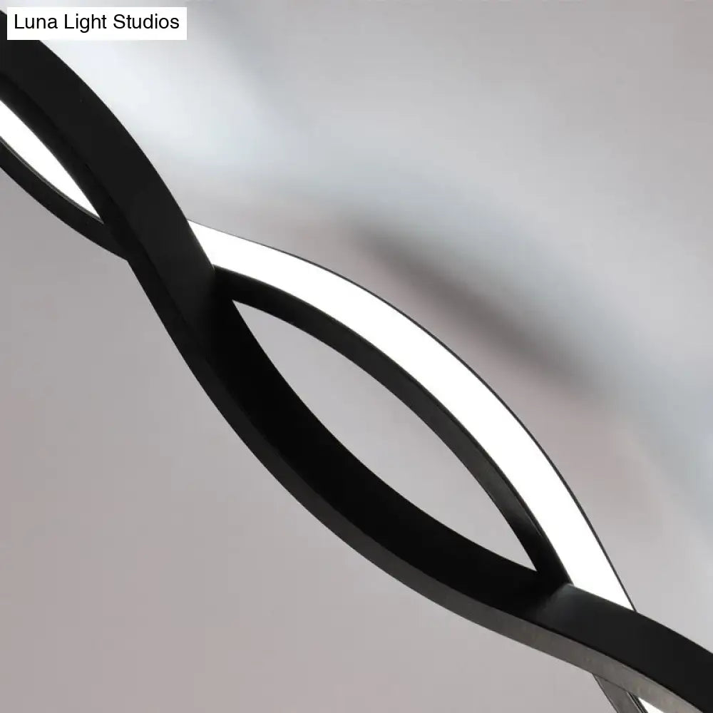 Modern twisted black and white led wall sconce with sleek design for bedroom and contemporary led wall lighting