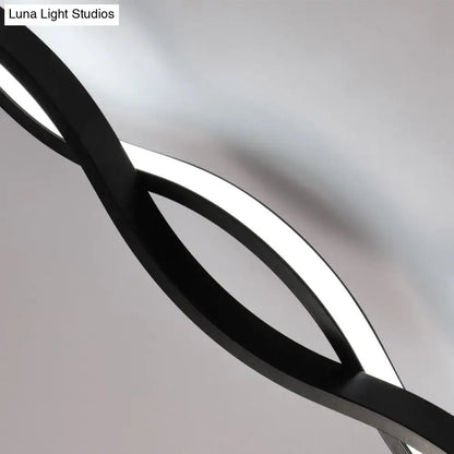 Modern twisted black and white led wall sconce with sleek design for bedroom and contemporary led wall lighting