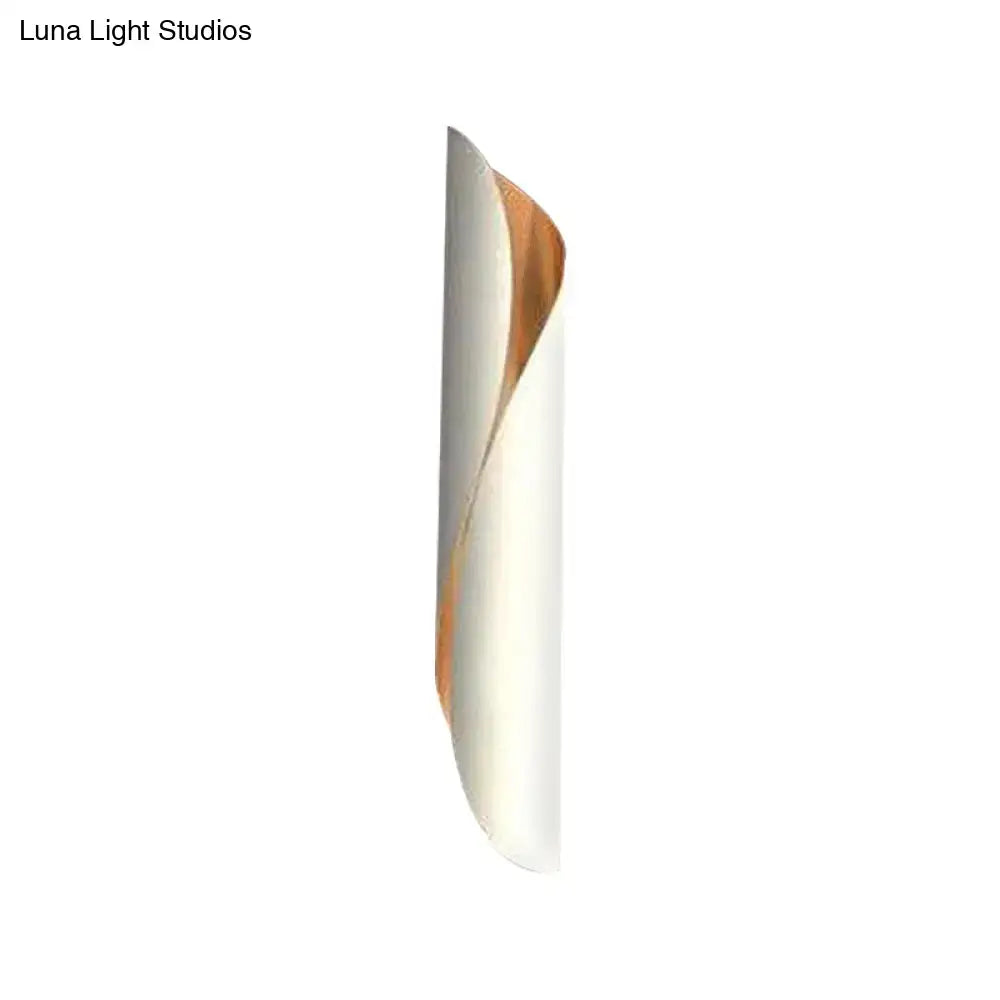 Modern twisted black and white wall lamp with sleek white exterior and warm copper interior for 110v-120v use