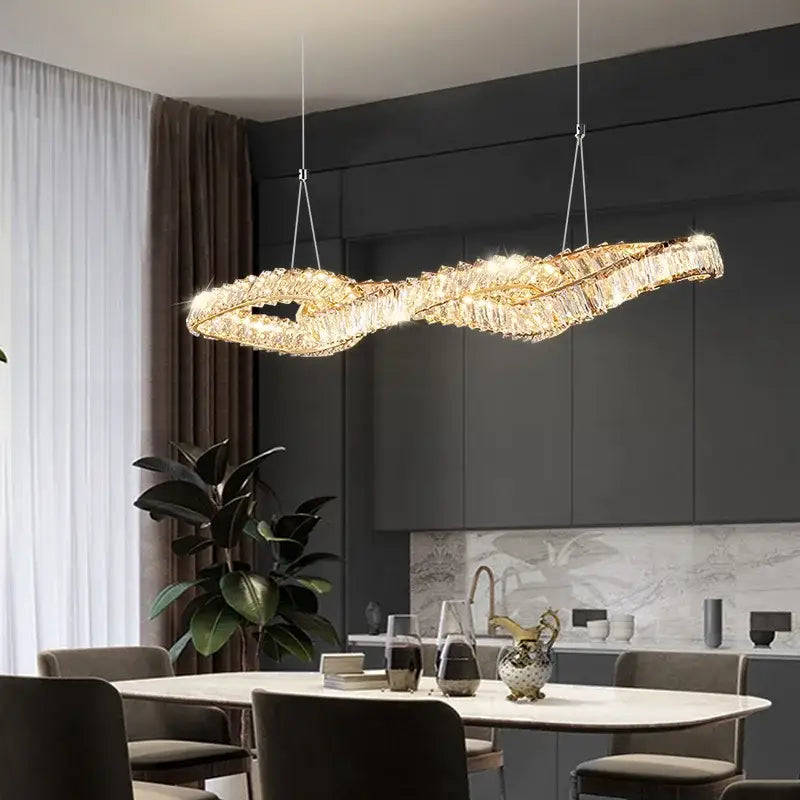 Modern twisted gold metal crystal pendant light with sleek twisted design for dining room decorbites gold metal