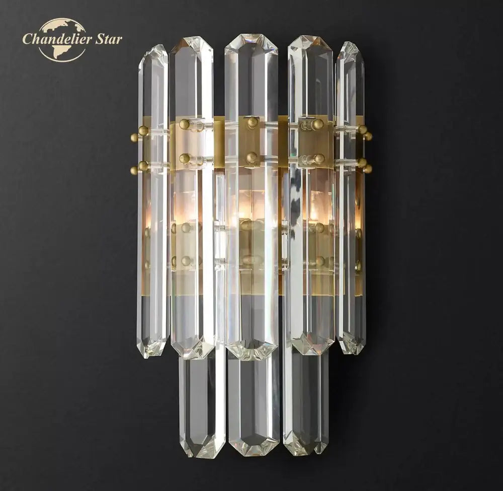 Modern two tier crystal led wall sconce with clear crystal prism and gold-toned metal accents for bedroom decorbites crystal led wall