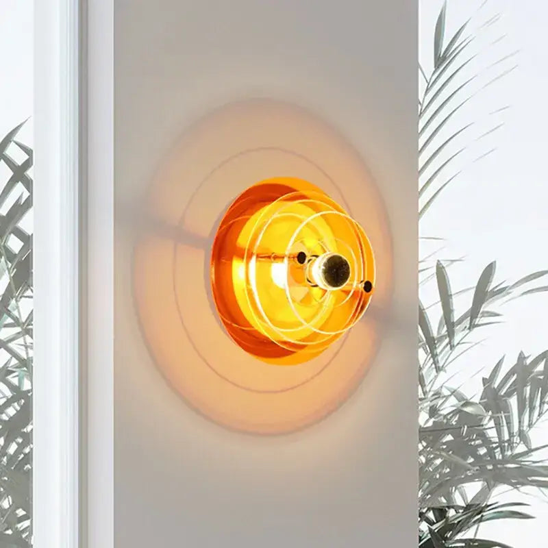 Modern ufo acrylic led wall lamp orange translucent glass wall lamp with concentric circular rings for living room decorbites led wall