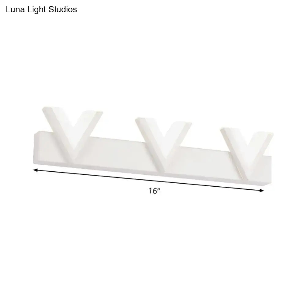 Modern 16-inch white wall-mounted vanity light with three stylized v-shaped warm white led lamps for bathroom mirror