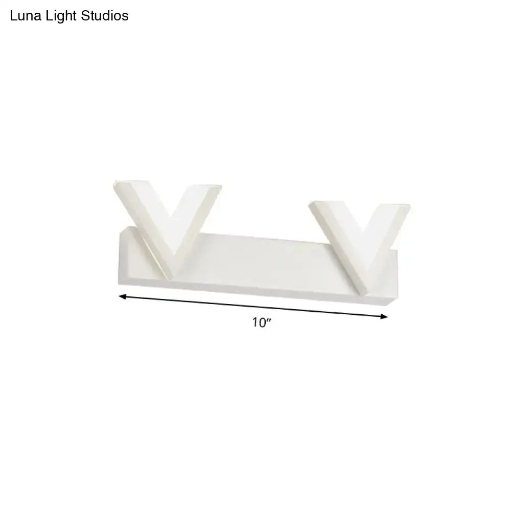 Modern v-shaped white led vanity light with sleek design emitting warm white light for bathroom mirror use