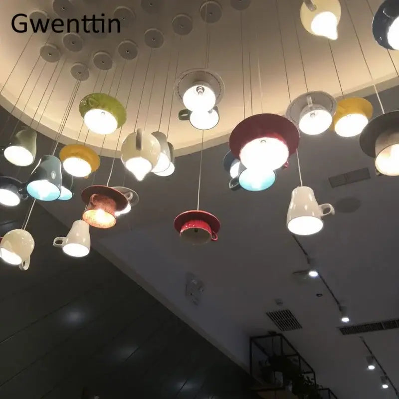 Colorful ceramic cup pendant lights hanging as modern vibrant kitchen decor featuring decorbites ceramic cup design