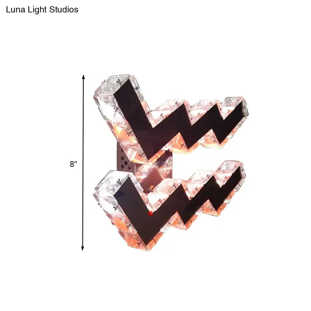 Modern w-shaped beveled crystal wall lamp with black zigzag patterns and led light suitable for bedroom use