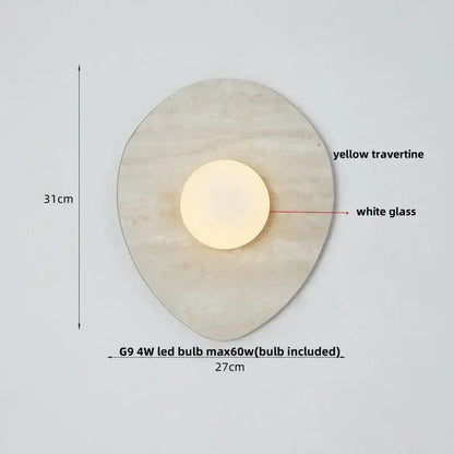 Modern wabi sabi led wall lamp with a circular yellow travertine base and white glass bulb for bedroom lighting