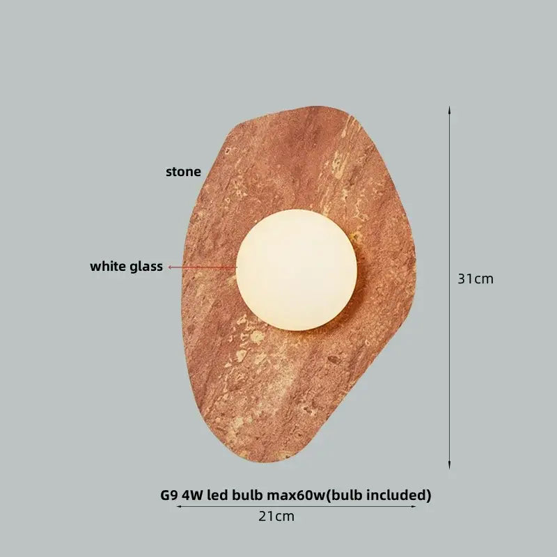 Modern wabi sabi black and cream resin led wall lamp featuring a rustic stone wall sconce with white glass globe