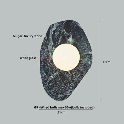 Modern wabi sabi black and cream resin led wall lamp with dark veined bulgari stone shell and white glass circle center