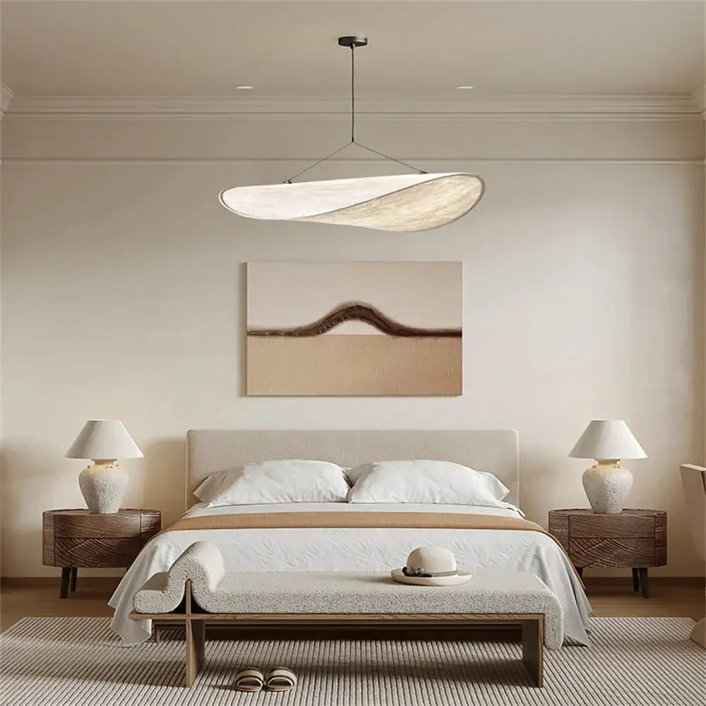 Modern wabi sabi white japanese style chandelier with sleek curved design hanging above bed for decorbites japanese style