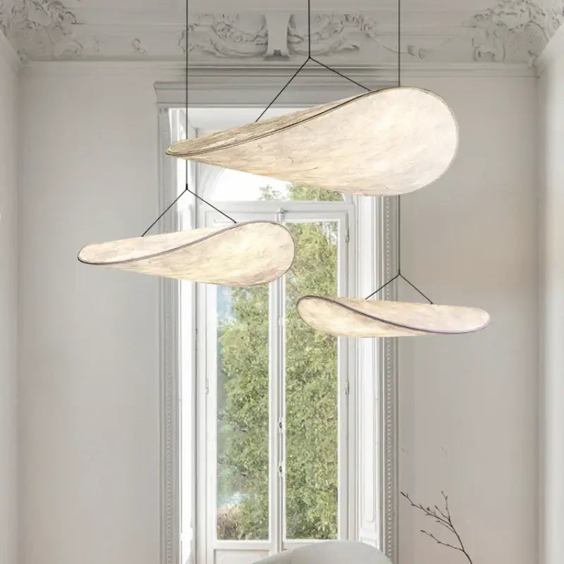 Modern wabi sabi white japanese style chandelier with textured cream leaf pendant lights and black cords decorbites japanese style