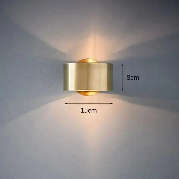 Modern wall lamp black gold brass finished cylindrical wall lamp with sleek design and warm light emission